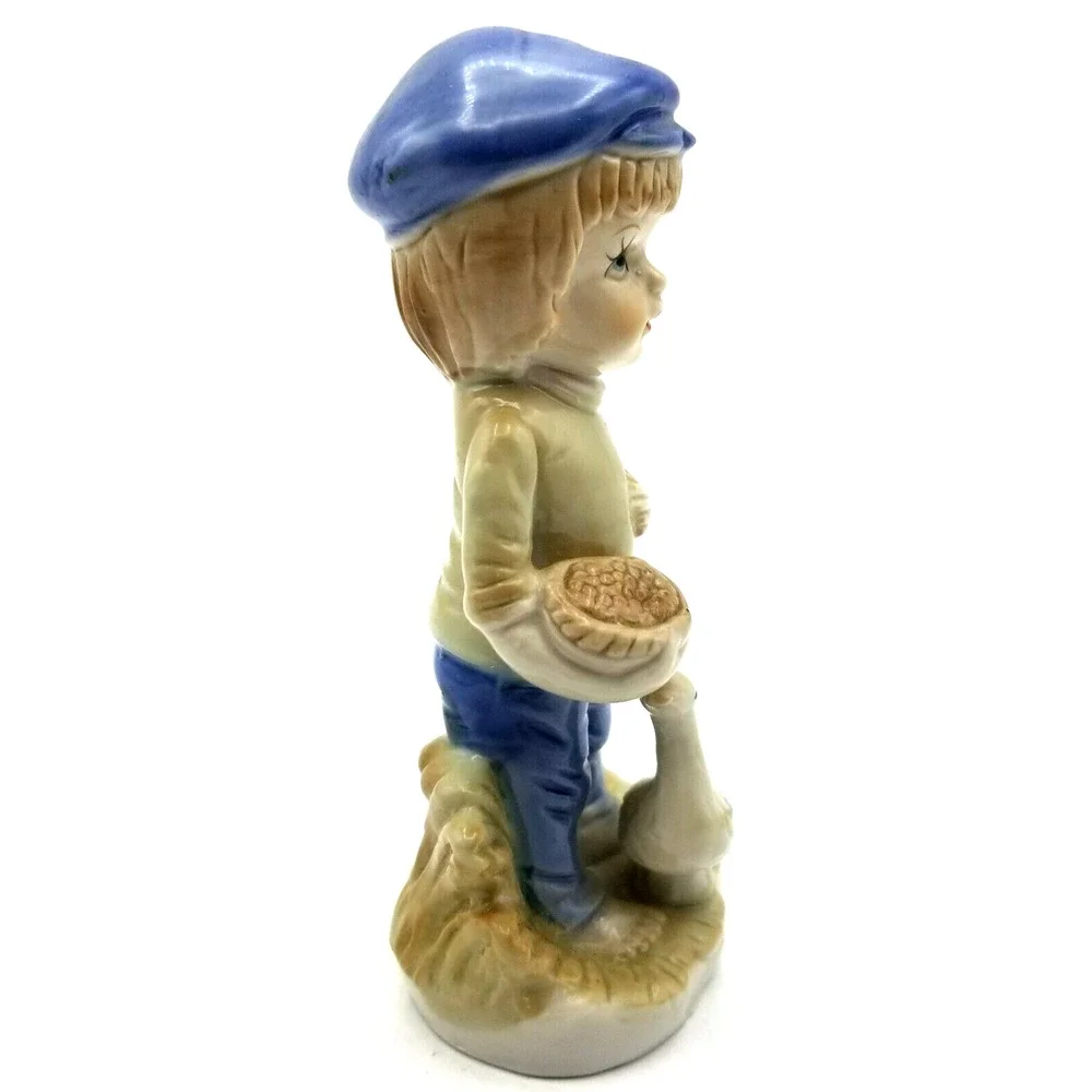 Vintage Porcelain Figurine Boy with Goose Blue Cap 5.5